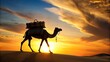 © methinee - Silhouette of camel with luggage in desert