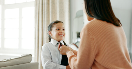 Canvas Print - School, dressing and mom with girl in home getting ready for education, learning and classes. Family, morning routine and happy mother with child prepare with tie, uniform and clothes for academy