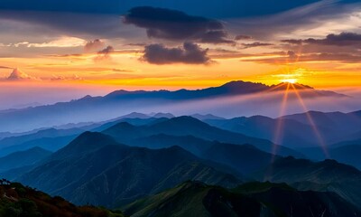 Wall Mural - Picturesque sunrise over mountain range with vivid colors
