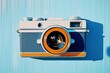 © Gophotograph - Photography of gadgets using a blue disposable camera.