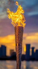 Canvas Print - A burning torch with a sunset cityscape in the background.