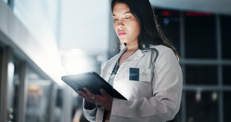 Poster - Woman, doctor and night with tablet for research, medical data or new discovery at hospital. Young, female person or healthcare employee working late on technology for medicinal information at clinic