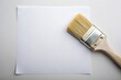 © methinee - White paper and used paintbrush with copy space background viewed from below