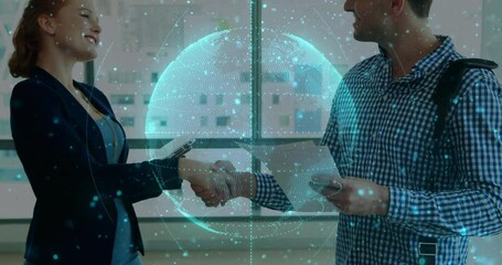 Sticker - Animation of globe over diverse business people shaking hands in office