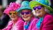 © 小源 刘 - Three elderly women in vibrant hats and sunglasses at a British polo show. One wears a fuchsia pink suit with a blue flower necklace, creating a lively, colorful scene against a black background.