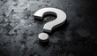 © AndiAzis - White question mark on a dark textured background.