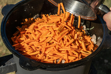 Sliced carrots for pilaf. Ingredients for pilaf. Vegetables