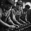 © Kristian - Black and white illustration of workers in flat caps and overalls assembling machinery in a gritty factory, capturing the labor-intensive tasks and harsh environment of the Industrial Revolution.
