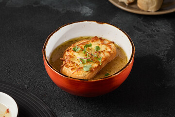 Canvas Print - Rustic Bowls of Classic French Onion Soup with Savory Cheese-Topped Bread