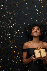 beautiful happy woman holding gift box, smiling with excitement, surrounded by golden confetti, celebrating festive moment. Black Friday sale