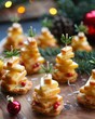 © Maryam - Festive Christmas Tree Bites. Cheese canapes in the shape of Christmas trees