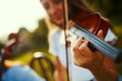 © StarDweller/peopleimages.com - Violin, music and hand of girl in garden for entertainment, talent and rehearsal for event. Musician, string instrument and playing in nature for art, practice and creativity with skill development