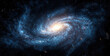 © oksa_studio - Spiral galaxy showing galactic arms and a bright center. High quality photo