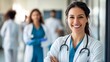 © IMAGINIAC - A Smiling Female Doctor Wearing a White Coat and Stethoscope