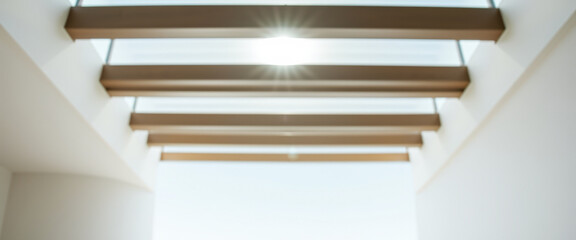 Wall Mural - Abstract Blurred Background Of Sun Shining Through Skylight