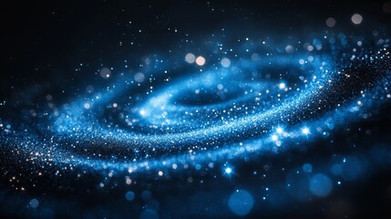 abstract swirling blue glitter galaxy. festive background with texture and bright lights.