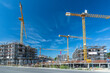 © Calado - Large construction site with several cranes, foundations and buildings