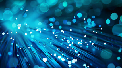 Wall Mural - a vibrant display of blue light beams and glowing particles creates a captivating abstract backgroun