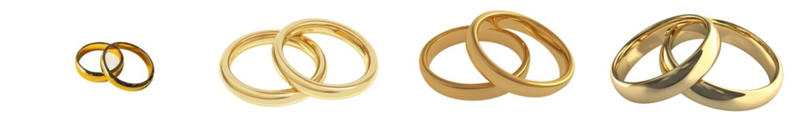 A pair of golden wedding rings cut out from stock.