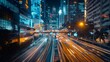 © Wish Craft Arts - A night view of a busy city street with speeding cars creating colorful light trails.
