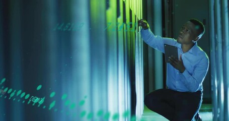 Wall Mural - Animation of data processing over biracial male worker in server room