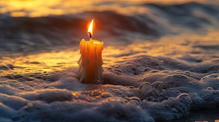 Wall Mural - A Burning Candle in the Foamy Surf at Sunset