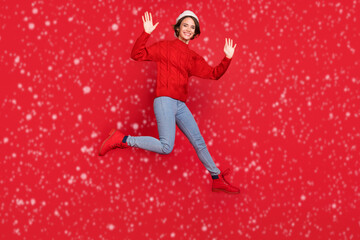 Poster - Full length body size photo woman in headwear jumping waving hand on meeting isolated vivid red color background