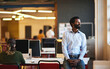 © StarDweller/peopleimages.com - Thinking, office and business black man with idea, solution and insight for company. Creative startup, entrepreneur and person with crossed arms for problem solving, brainstorming and reflection