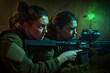 © Josu - Two female soldiers aiming rifles in combat zone.