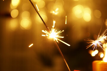 christmas sparkler on bokeh background