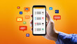 © hide - 手に持たれたスマートフォンの画面に複数のメールや通知の一覧が表示されており、背景は明るいオレンジ色です。画面の外側にはカラフルな吹き出しやアイコンが浮かび、デジタルメッセージのやり取りやコミュニケーションを象徴しています。generative AI