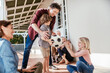 © Marko Geber - Family playing with soccer ball on patio together