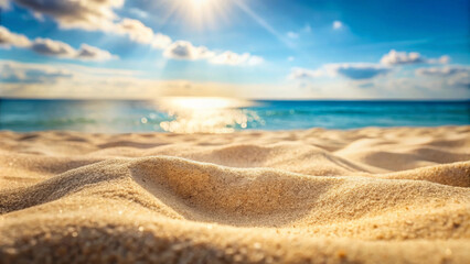 A close up view of soft sand with blurred sea and sky background, capturing serene beauty of sunny beach. sunlight reflects off water, creating tranquil atmosphere