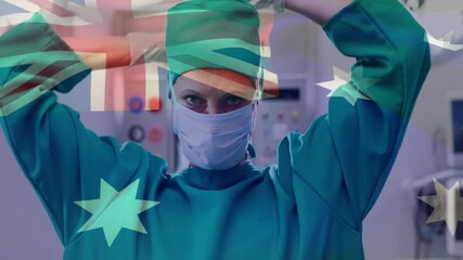 Sticker - Animation of flag of australia over caucasian female surgeon with face mask