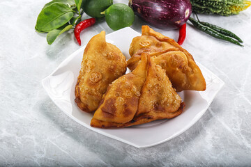 Wall Mural - Indian cuisine - fries crispy samosa