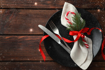 Canvas Print - Christmas setting with festive decor on wooden table, top view. Space for text. Bokeh effect