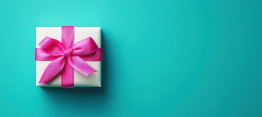 Sticker - Bright White Gift Box with Pink Ribbon on Turquoise Background - Perfect for Celebrations and Gifts