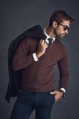 Wall Mural - Business, man and confident with sunglasses for fashion in studio on gray background as lawyer. Male person, proud and serious with blazer for career growth or opportunity with style and elegance