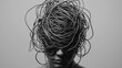 © Exnoi - A head full of tangled wires, representing mental confusion and overload due to constant stress
