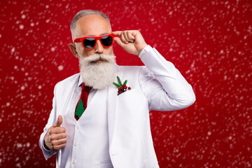 Canvas Print - Photo of nice elder white hair man look empty space wear spectacles white jacket isolated on red color background