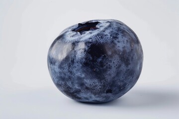 Canvas Print - A blueberry fruit on a white background, perfect for food and nature images