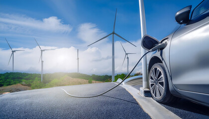 Wall Mural - turbine on the road with electric car charging