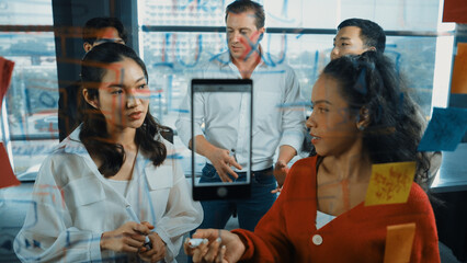 Portrait of group of professional diverse start up business team present marketing plan to investor. Business team brainstorming, discussion about new product and marketing strategy. Manipulator.