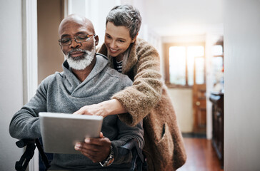 Canvas Print - Couple, wheelchair and elderly on tablet in home, streaming entertainment and relax together. People, watching and online for series subscription, reading ebook and support in marriage or retirement