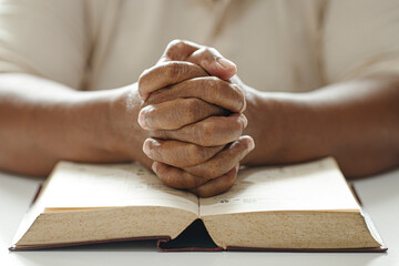 Hands woman with bible praying. Christian concept.