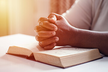 Hands woman with bible praying. Christian concept.