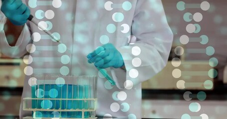 Wall Mural - Animation of dna strands data processing over caucasian male scientist in laboratory