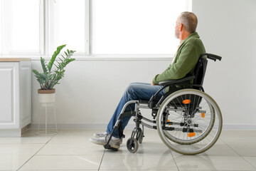 Canvas Print - Senior man in wheelchair at home