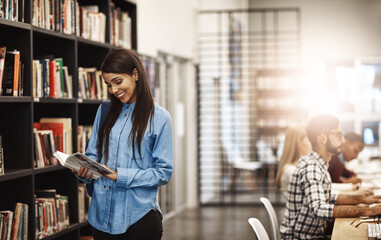 Aufkleber - Woman, college student and happy at library with textbook on bookshelf for research and study. Female person, university learner and smile with reading for education, literature and knowledge
