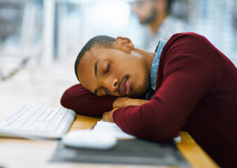 Canvas Print - Man, college student and sleeping on desk at library with burnout or tired with research for assignment deadline. Male person, university learner and exhausted with studying for exams or assessment